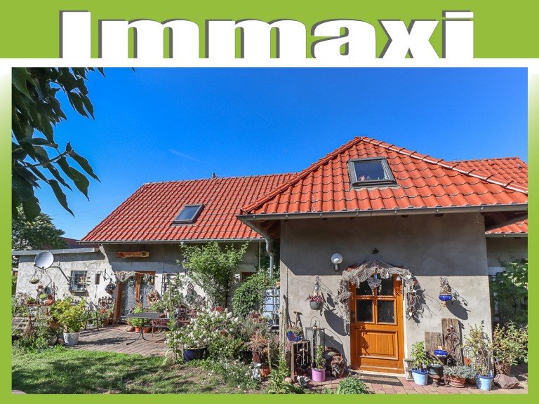 Hausansicht-mit-Terrasse-und-Stellplatz L�tzen / Michlitz Einfamilienhaus L�TZEN/MICHLITZ + HISTORISCHES EINFAMILIENHAUS ZUM KAUF + VERMIETET
