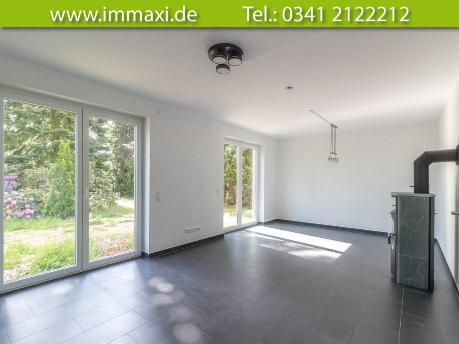 Wohnzimmer-mit-Kamin Einfamilienhaus Leipzig