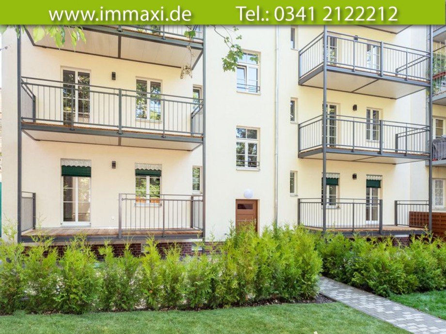 Hausansicht R�ckseite mit Balkon und Terrasse Erdgeschosswohnung Leipzig